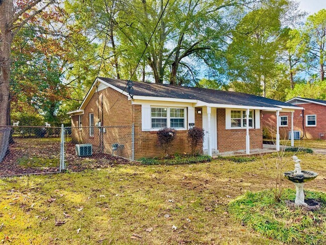 Photo - Charming 3-Bedroom Home with Cozy Living Spaces!