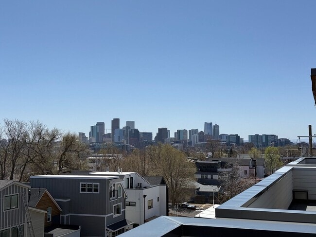 Photo - Modern End Unit Townhome with Rooftop Oasis | 2 Bedrooms, 2.5 Baths | Prime Location