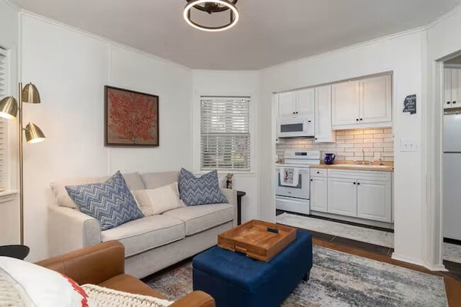Building Photo - Fully Furnished 1-Bedroom Condo – Steps fr...