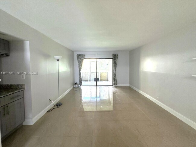 Building Photo - 9370 SW 8th St Unit 107