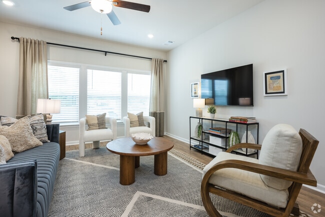 3BR, 2.5BA - 1735SF - Living Room - The Courts at Maverick Yards