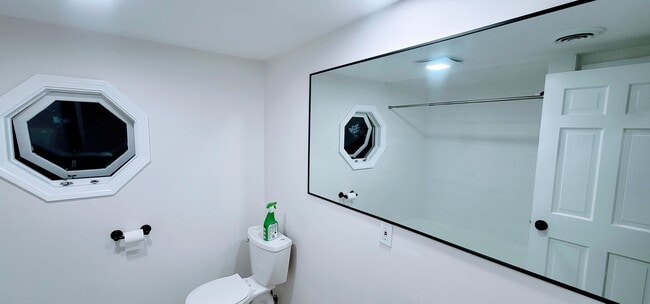 Photo - 3-Story Townhouse with Central Heat, AC and 2 Parking Spots Included