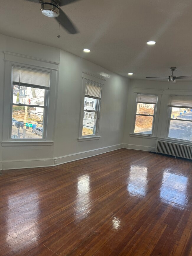 Living Room. Side St View - 214 Oak St Unit 3