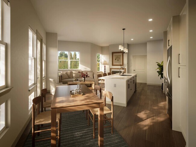 Cocina y comedor de concepto abierto con acabados de líneas limpias, una isla espaciosa y luz natural que da forma a los espacios de reunión cotidianos. - Modera Weston