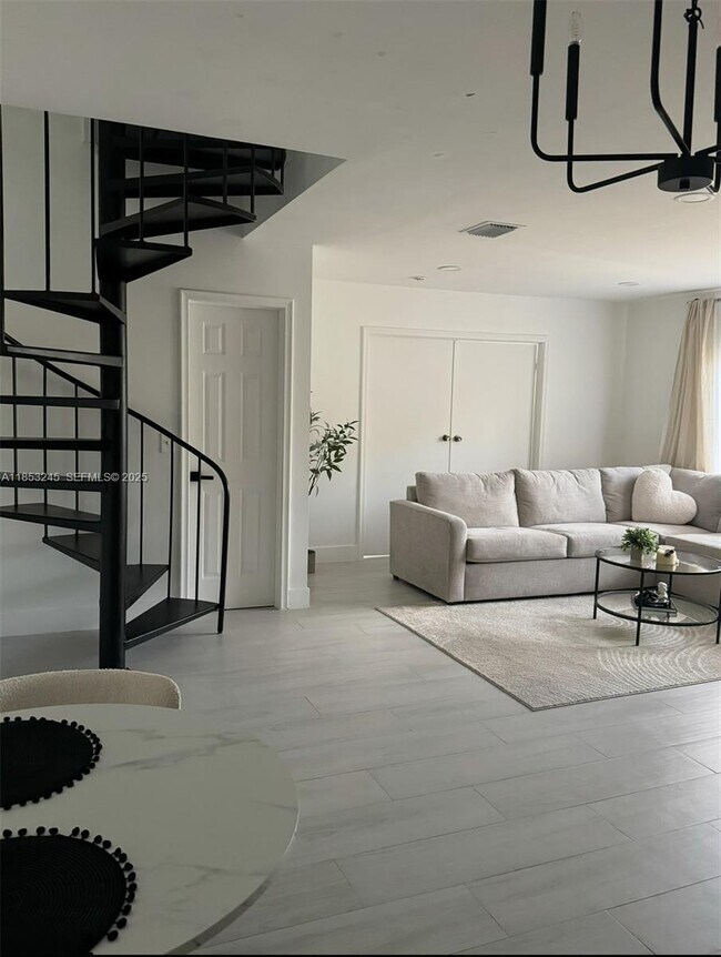 Building Photo - 8660 SW 149th Ave Unit 211