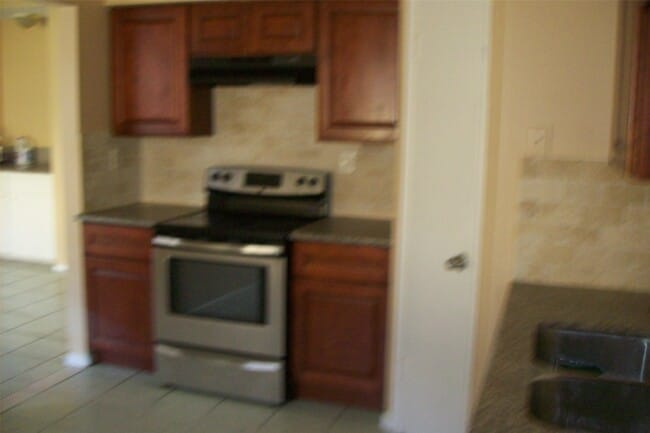 Building Photo - 10526 Crescent Moon Dr Rental