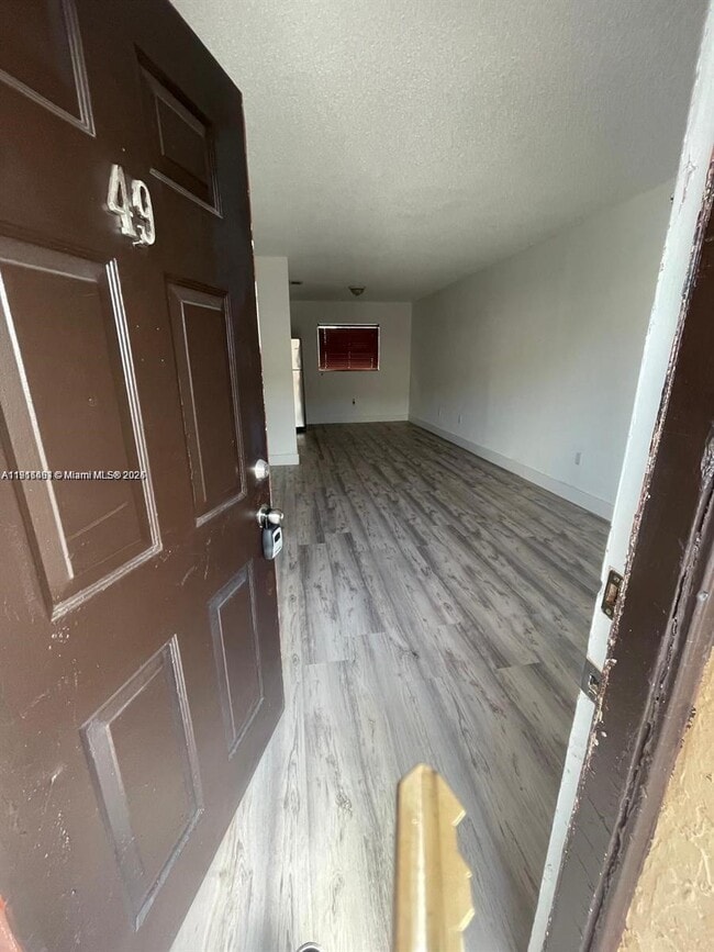 Building Photo - 5491 W 24th Ave Unit 49