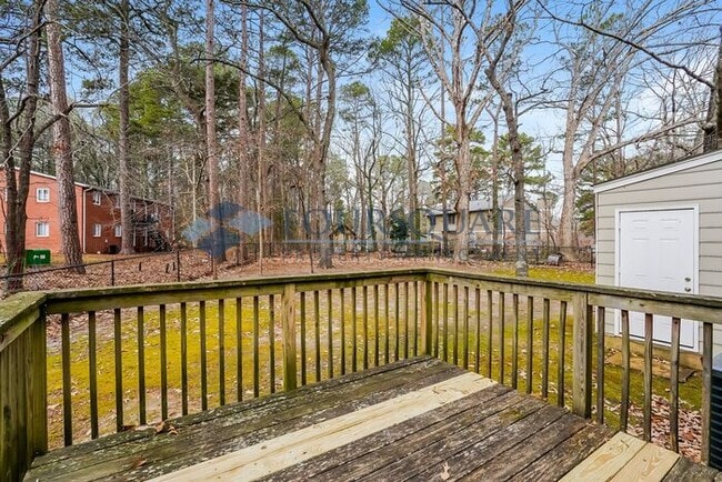 Photo - Charming 2-Bed / 2-Bath Duplex with Open Floor Plan & Shared Fenced Yard , Near I-40