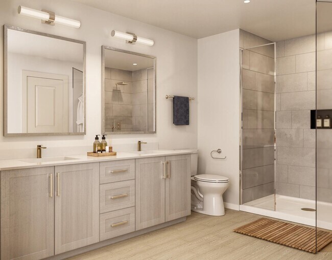 Thoughtful bathroom design at Modera Walsh Heights pairs clean finishes with a spacious layout for a polished, comfortable retreat. - Modera Walsh Heights