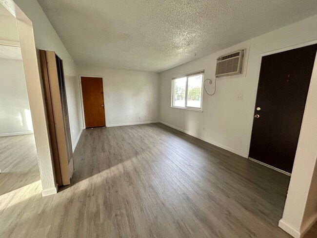 Building Photo - $500 off First Month Rent! Charming 2x1 With Attached Garage & Backyard!