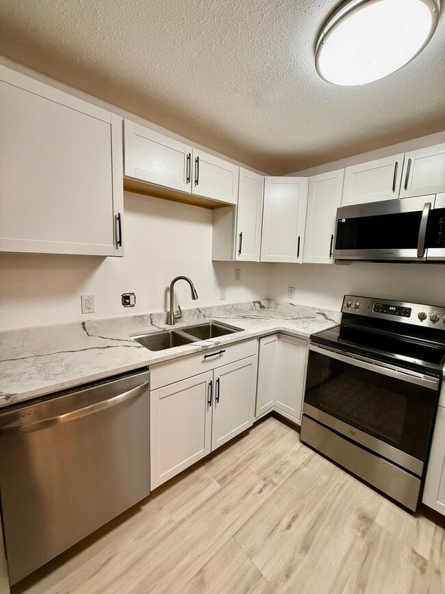 Photo - Fully Remodeled 2 Bed | 1 Bath Ground-Level Condo – No Stairs!