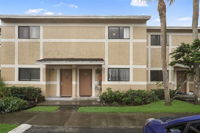 Building Photo - 9468 S Palm Dr