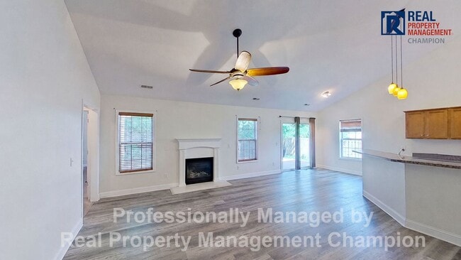 Building Photo - 3BD/2BA home w/vaulted ceilings, fireplace, 2-car garage, deck and fenced backyard
