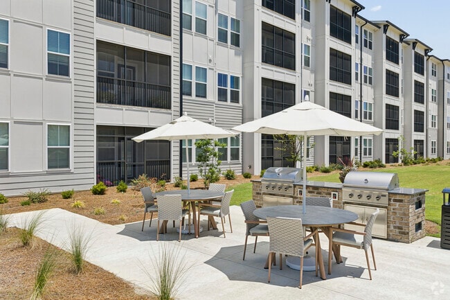 Outdoor Pavilion with Kitchen, Fire Pits, and Game Area - Monument at Pooler