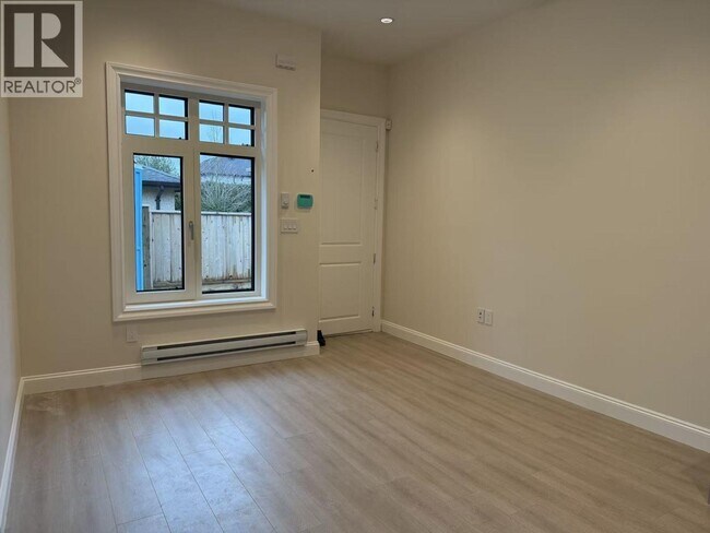 Photo - 1115 W 48th Ave