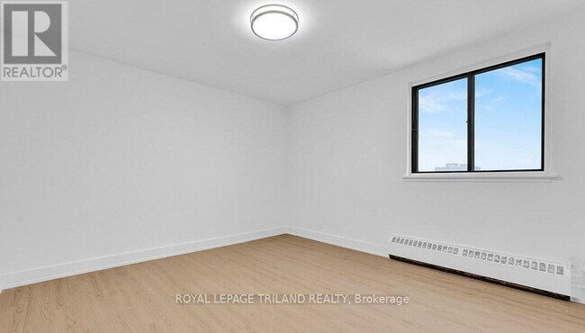 Photo - 671 Woolwich St Unit 402