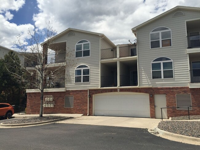 Building Photo - **Coming Soon** 2 Bed/2 Bath Top Floor Condo with Covered Garage Space and Additional Storage