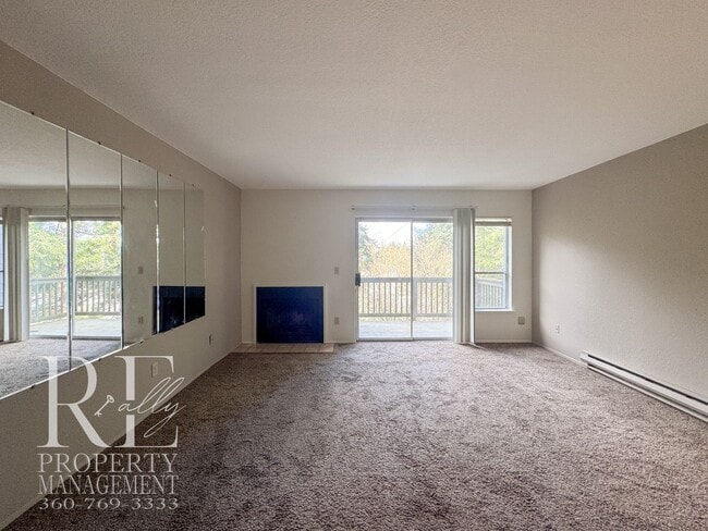 Photo - Bright End-Unit Townhome with Loft, Fireplace & Wooded Balcony