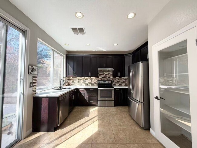 Photo - Wonderful corner lot home features 4 bedrooms and 3 full bathrooms