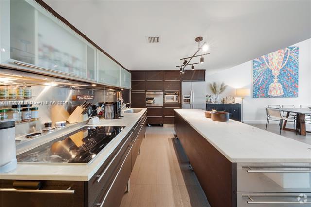 Building Photo - 6000 Collins Ave Rental
