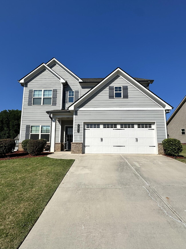 Building Photo - Beautiful 4BR Home in Mundy Mill | Corner Lot | Resort-Style Amenities