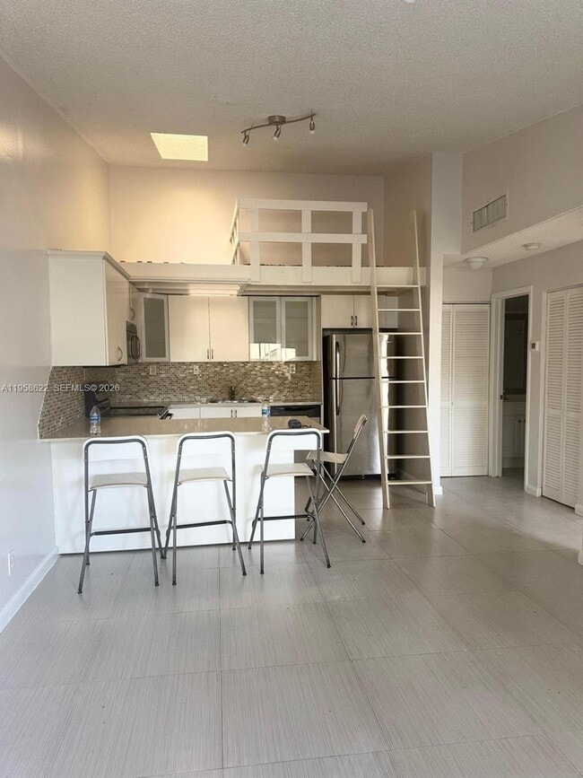 Building Photo - 3637 NW 99th Terrace Unit 9B