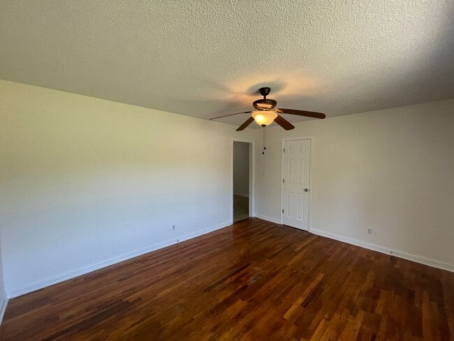 Photo - Freshly painted 3 bedroom 1.5 bath house with very large yard! Pet Friendly!