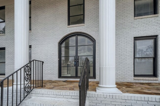 Photo - Furnished Estate Home - Double Curved Stairway - Marble Floors - Waterfall Island