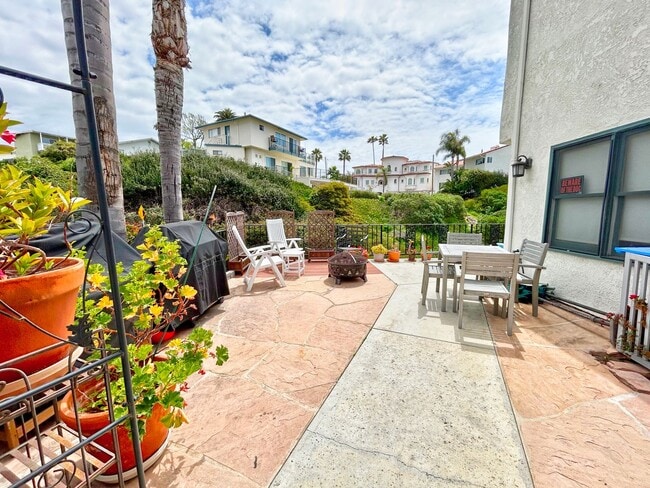 Photo - Steps to the beach from this Ocean View Condo with 2 car garage