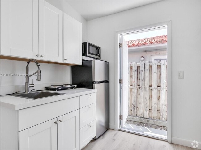 Building Photo - 7172 SW 22nd St Unit D Rental