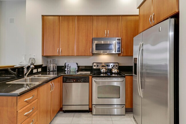 Building Photo - 801 S Olive Ave Unit 223