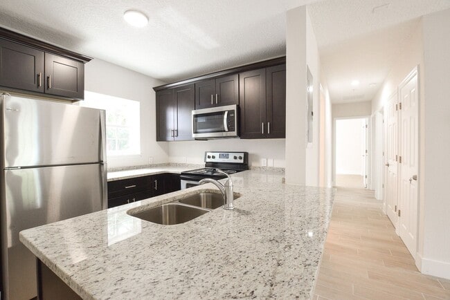 Building Photo - 5520 Lake Underhill Rd Unit 305