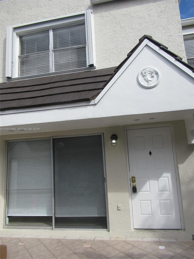 Building Photo - 6825 SW 45th Ln Unit 12