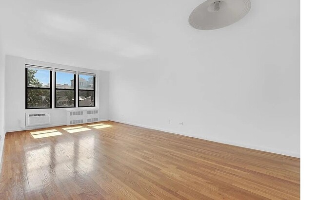 Building Photo - 35-20 Leverich St