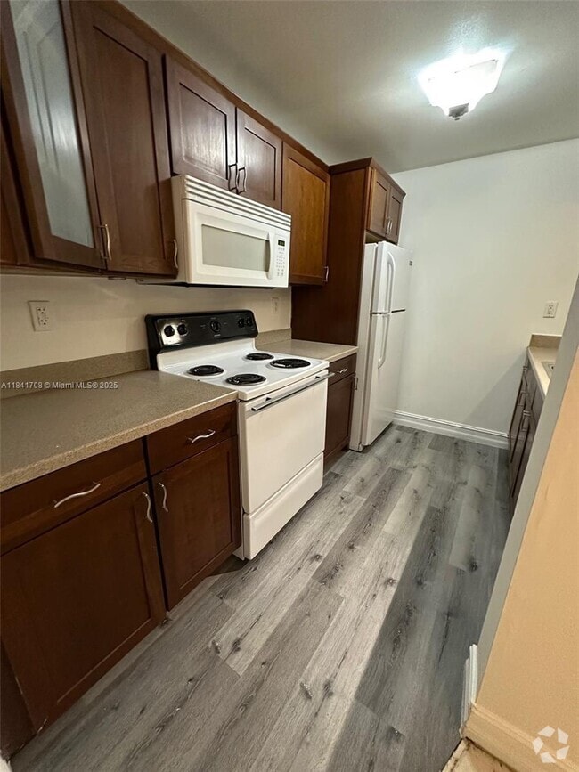 Building Photo - 7075 NW 186th St Unit C504 Rental
