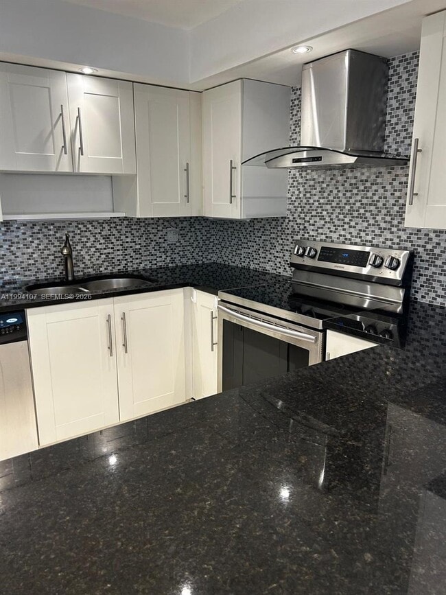 Photo - 501 Three Islands Boulevard Unit 108