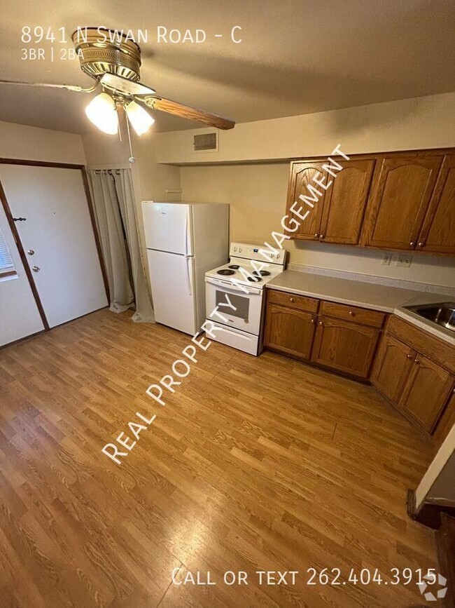 Building Photo - 8941 N Swan Rd Unit C Rental