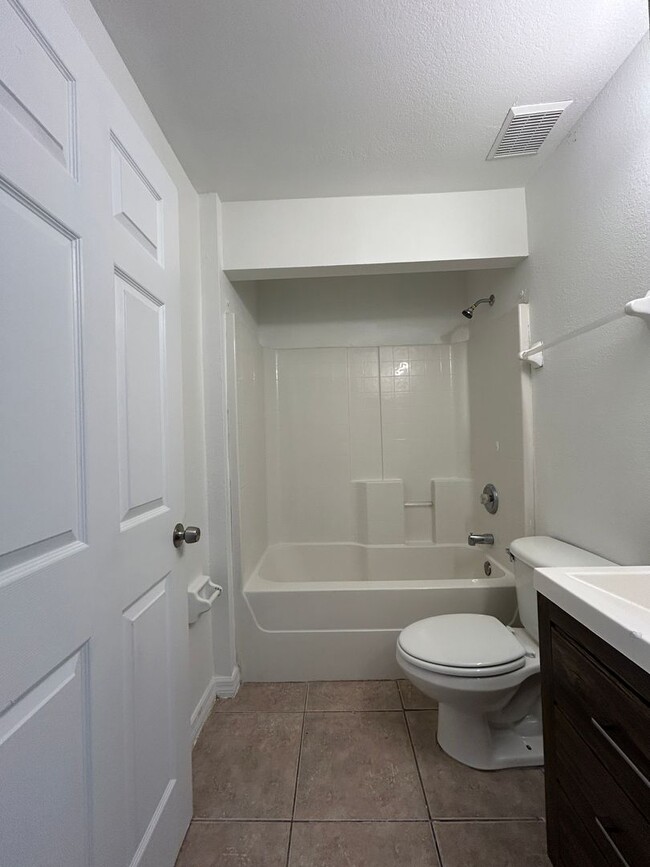 Photo - Lehigh Acres Duplex Rental 3BR/2Bath | Tile Floors Throughout + Lawn Care Included