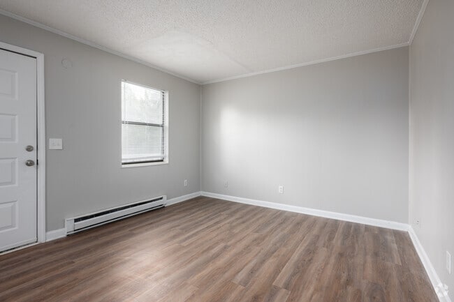 1BR, 1BA - 700SF - Living Room - Cedar Green