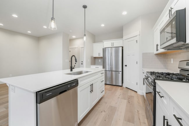Photo - Spacious 4-Bedroom Townhome in Saratoga Springs - Modern Living & Prime Location