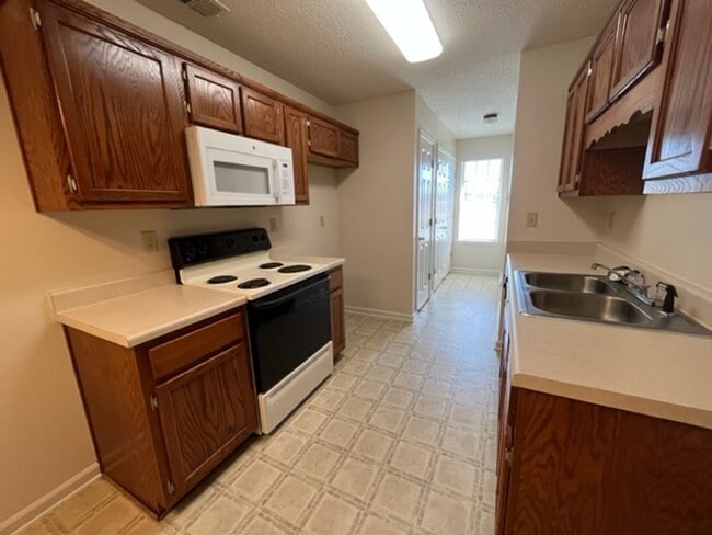 Photo - Renovated 4 Bedroom 3 Bath Townhome for Rent!