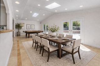 AI Staged dinning room. - 6201 Corbin Ave