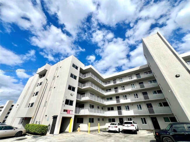 Building Photo - 9915 W Okeechobee Rd Unit 2-506