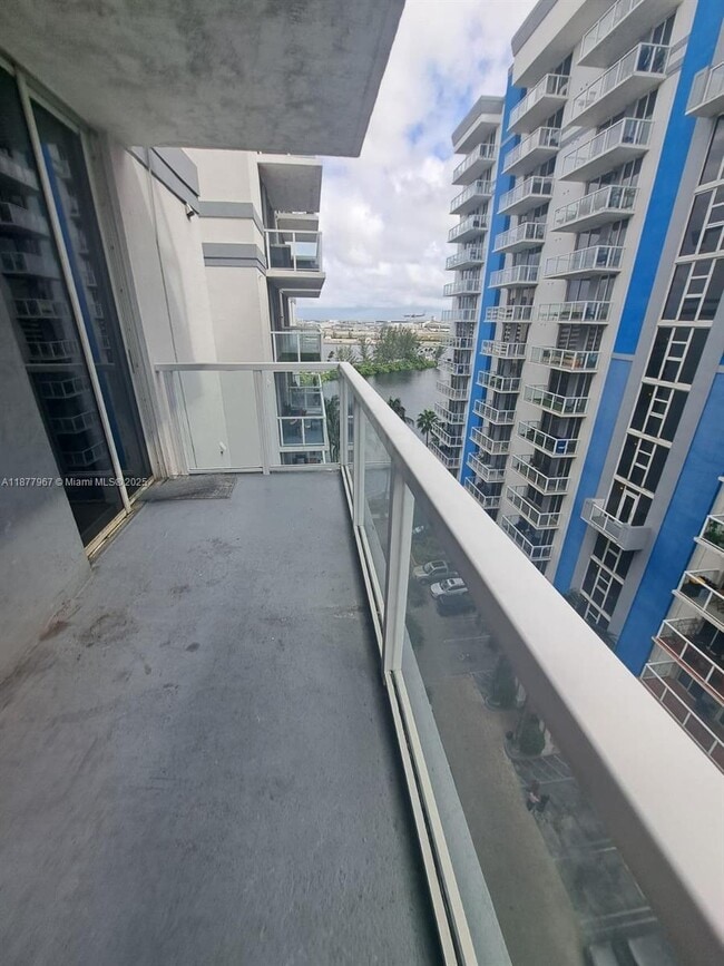 Building Photo - 5091 NW 7th St Unit 1007
