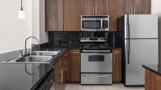 Kitchen with Stainless Steel Appliances - The Drexel Collective
