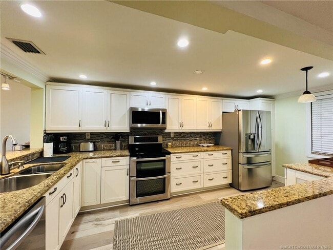 Building Photo - 10044 S Ocean Dr Unit 203