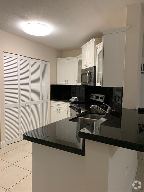 Building Photo - 6288 NW 186th St Unit 1XX Rental