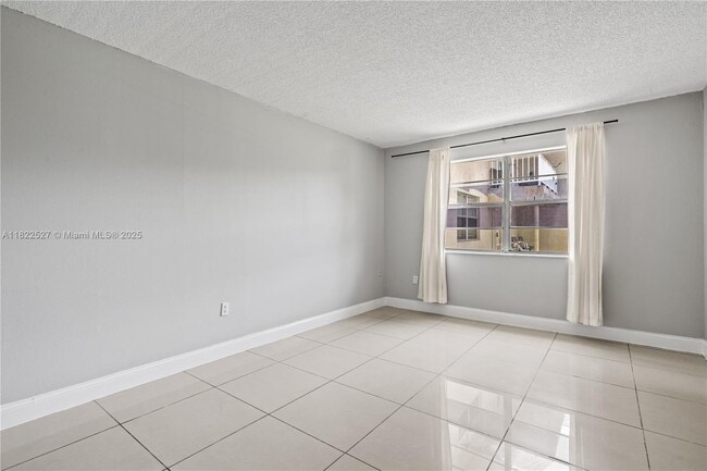 Photo - 301 NW 177th St Condo Unit 104