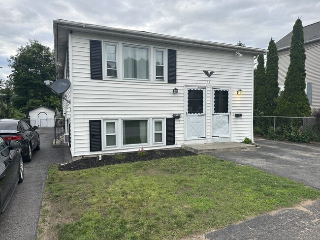 front of house (2 parking spots on left side of the house) - 34 Hayes Ave Unit #1