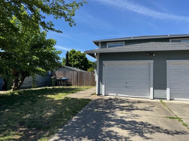 Photo - Charming 3 bedroom 1.5 bathroom Two story Town House with an attached garage.